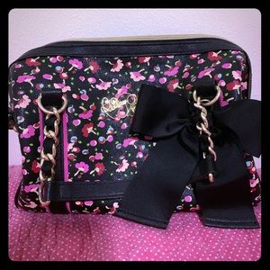 New Betsey Johnson black floral purse.